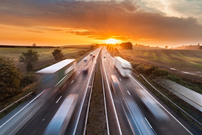 trucks-and-cars-on-motorway-shutterstock